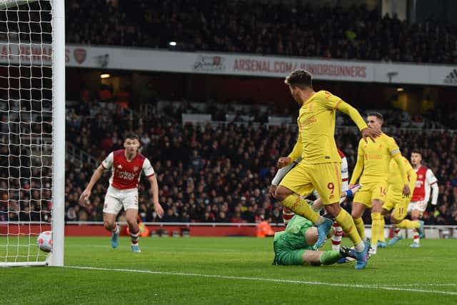 Roberto Firmino scores for Liverpool against Arsenal. Picture: John Powell/Liverpool FC via Getty Images