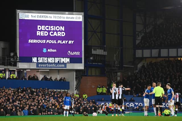 The big screed at Goodison Park shows Allan has been given a red card after a VAR review. Picture: Stu Forster/Getty Images