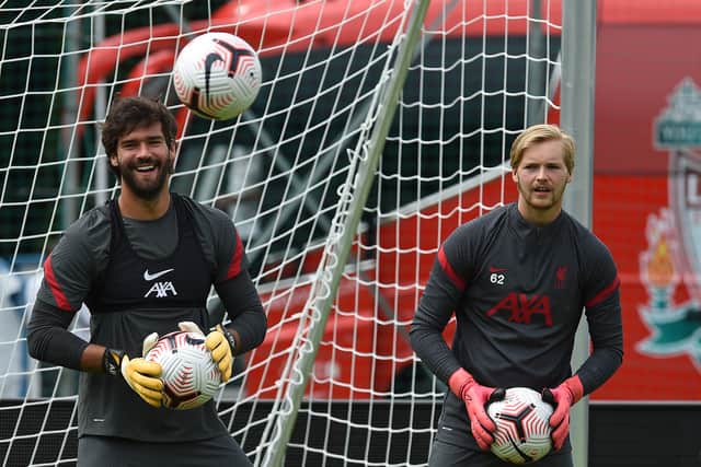 Liverpool goalkeepers Alisson Becker and Caoimhin Kelleher. Picture: John Powell/Liverpool FC via Getty Images