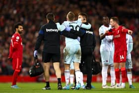 Jarrod Bowen of West Ham United receives medical treatment before being substituted off (Photo by Clive Brunskill/Getty Images)
