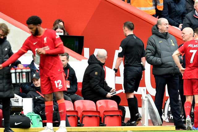  Stuart Attwell referee watching the VAR monitor. Picture: Andrew Powell/Liverpool FC via Getty Images