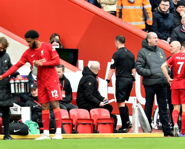  Stuart Attwell referee watching the VAR monitor. Picture: Andrew Powell/Liverpool FC via Getty Images