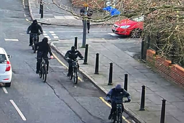 An image of four masked youths police want to speak to in connection to the shooting on Upper Warwick Street.