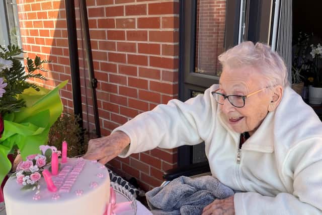 Marjorie Hodnett, 108, cuts her birthday cake