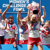St Helens lifts the Betfred Women’s Challenge Cup trophy in 2021. Photo: Lewis Storey/Getty Images