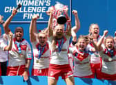 St Helens lifts the Betfred Women’s Challenge Cup trophy in 2021. Photo: Lewis Storey/Getty Images