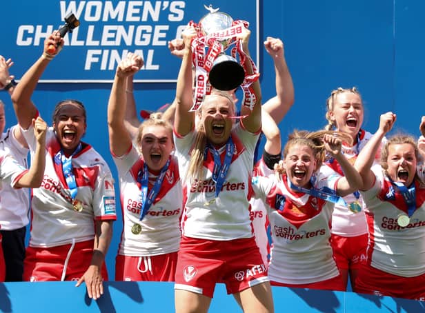 <p>St Helens lifts the Betfred Women’s Challenge Cup trophy in 2021. Photo: Lewis Storey/Getty Images</p>