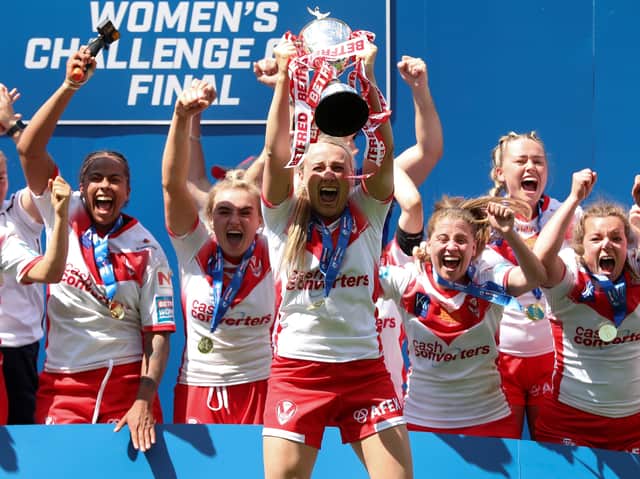 <p>St Helens lifts the Betfred Women’s Challenge Cup trophy in 2021. Photo: Lewis Storey/Getty Images</p>