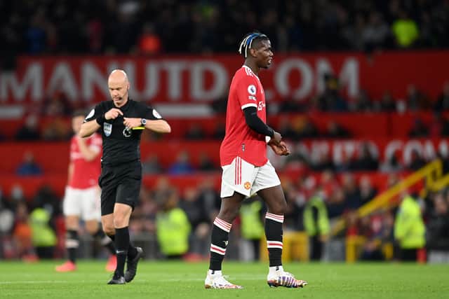 Referee Anthony Taylor gave Paul Pogba his marching orders during Liverpool’s 5-0 rout at Manchester United. 