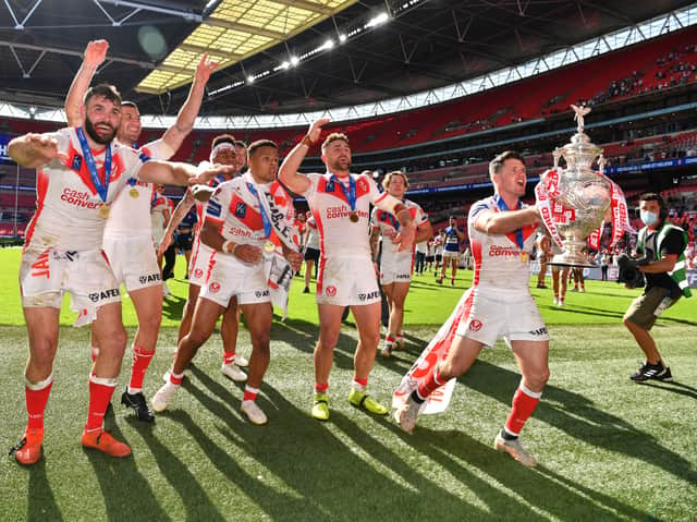 <p>St Helens celebrate winning the 2021 Betfred Challenge Cup Final. Photo: Tony O’Brien/Getty Images</p>