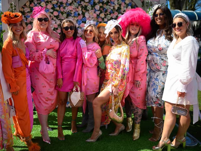 Pinks and oranges seemed to be very popular at Aintree on Friday.