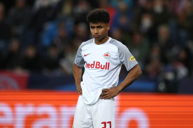 arim Adeyemi of FC Red Bull Salzburg looks on during the UEFA Champions League Round Of Sixteen Leg One match between FC Red Bull Salzburg and FC Bayern