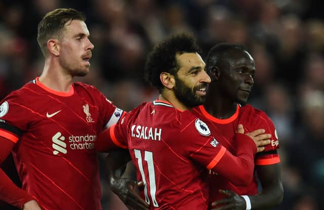 <p>Mo Salah celebrates scoring for Liverpool against Manchester United with Sadio Mane who proved the assist. Picture: Andrew Powell/Liverpool FC via Getty Images</p>