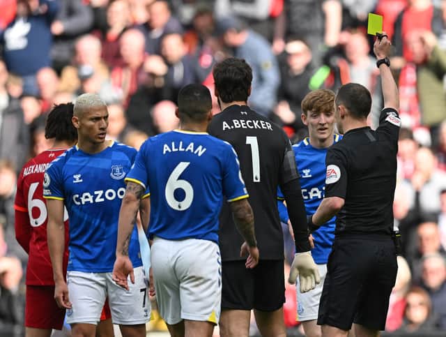Anthony Gordon is booked for simulation against Liverpool. Picture: PAUL ELLIS/AFP via Getty Images