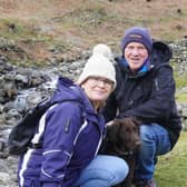 53-year-old John Boylett pictured in the Lake District earlier this month with his wife Susan and dog Hugo. Photo: LUHFT