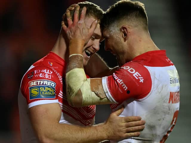 <p>Joey Lussick and Tommy Makinson of St Helens. Photo: Gareth Copley/Getty Images</p>