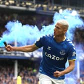 Richarlison of Everton celebrates with a flare after scoring their team’s first goal during the Premier League match between Everton and Chelsea at Goodison Park on May 01, 2022 in Liverpool, England. (Photo by Jan Kruger/Getty Images)