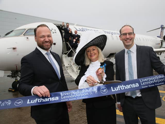 (L to R) Heinrich Lange, High Sheriff Lesley Martin-Wright and John Irving cutting the ribbon on Lufthansa’s new Frankfurt service from Liverpool.  Photo: LJLA
