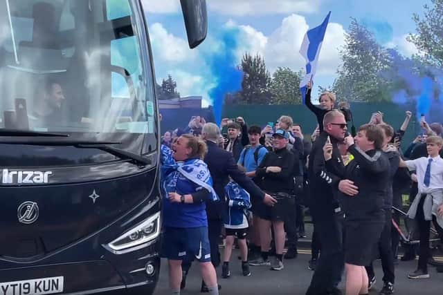 Frank Lampard fist pumps Everton fans as the team coach leaves Finch Farm. Image: Emily Bonner