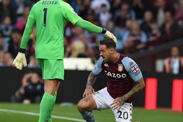 Alisson smothered Aston Villa striker Danny Ings late on to keep Liverpool ahead and secure three crucial points 