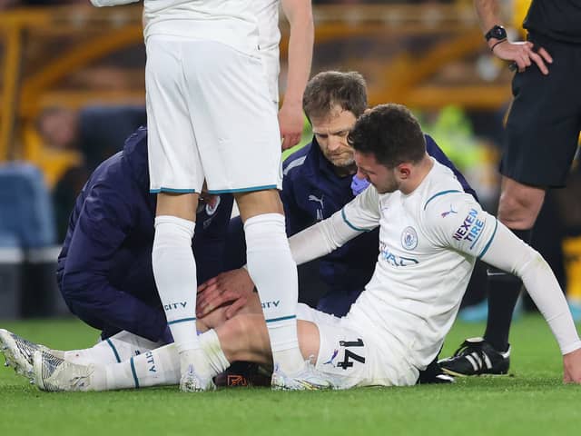Aymeric Laporte receives treatment during Man City’s win at Wolves. Picture: Catherine Ivill/Getty Images