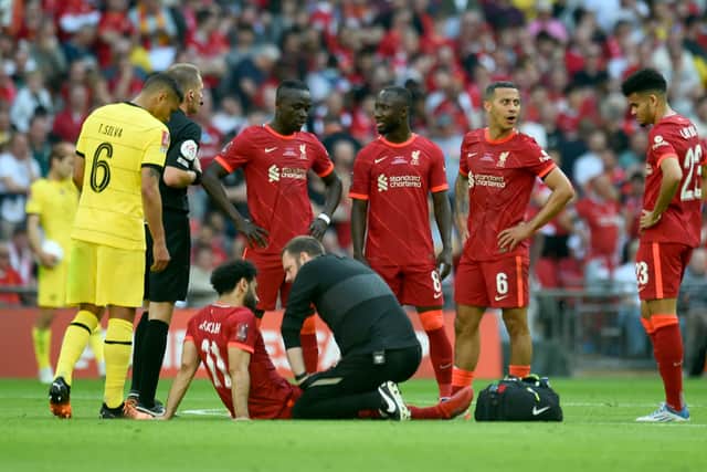 Mo Salah receives treatment during Liverpool’s FA Cup final triumph. Picture: Andrew Powell/Liverpool FC via Getty Images