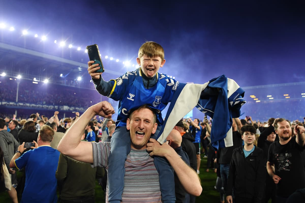20 simply stunning photos of Everton fans pitch invasion celebrating  Premier League survival | LiverpoolWorld
