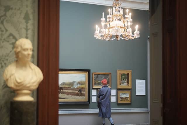 A woman views the art works on display at Liverpool’s Walker Art Gallery. Image: Christopher Furlong/Getty Images