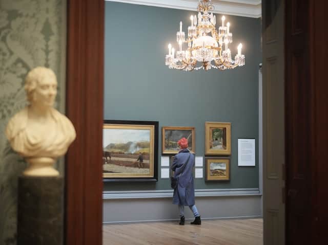 A woman views the art works on display at Liverpool’s Walker Art Gallery. Image: Christopher Furlong/Getty Images