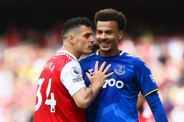 Dele Alli and Granit Xhaka share a few choice words during Everton’s 5-1 defeat at Arsenal 