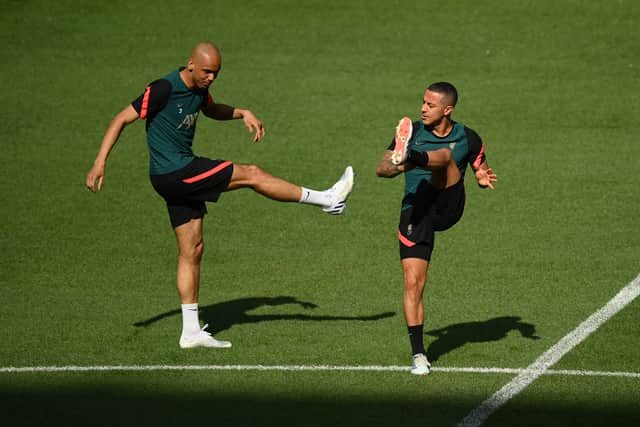 Fabinho and Thiago Alcantara of Liverpool stretch during the Liverpool FC Training Session at Stade de France on May 27, 2022 in Paris, France. Liverpool will face Real Madrid in the UEFA Champions League final on May 28, 2022. (Photo by Matthias Hangst/Getty Images)