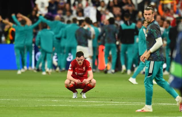 Andy Robertson of Liverpool Dejected at the end UEFA Champions League final match between Liverpool FC and Real Madrid at Stade de France on May 28, 2022 in Paris, France. (Photo by Andrew Powell/Liverpool FC via Getty Images)