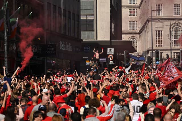Fans gather in the city centre ahead of the UEFA Champions League final between Liverpool and Real Madrid. Photo: OLI SCARFF/AFP via Getty Images