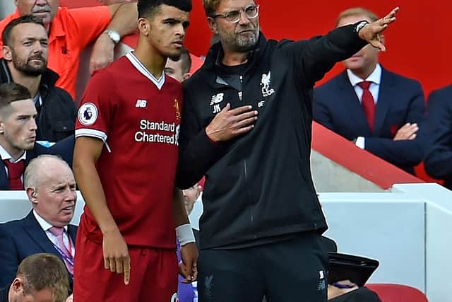 Liverpool manager Jurgen Klopp speaks to Dominic Solanke. Picture: Andrew Powell/Liverpool FC via Getty Images