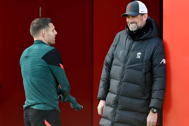 Liverpool boss Jurgen Klopp speaks with James Milner. Picture: Andrew Powell/Liverpool FC via Getty Images