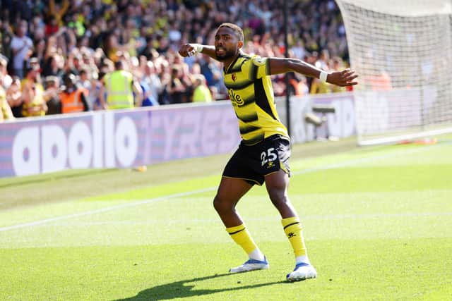  Emmanuel Dennis of Watford FC celebrates after scoring their team's first goal during the Premier League  (Photo by Luke Walker/Getty Images)
