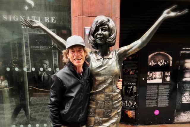 Mick Jagger with the Cilla Black statue on Matthew Street. Image: @MickJagger/twitter