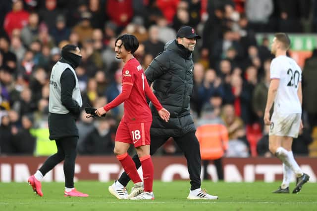 Takumi Minamino with Liverpool boss Jurgen Klopp. Picture: Michael Regan/Getty Images
