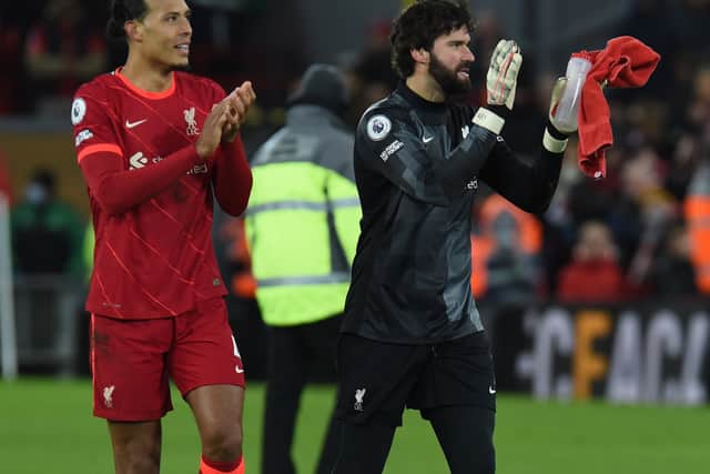 Liverpool pair Virgil van Dijk and Alisson Becker. Picture: John Powell/Liverpool FC via Getty Images