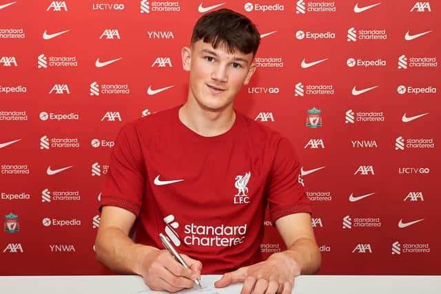 New Liverpool signing Calvin Ramsey signs for the club. Image: Nick Taylor/Liverpool FC/Liverpool FC via Getty Images