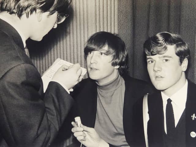 John Hill, right, with John Lennon and an unknown newspaper reporter. Image: David Duggley Auctioneers / SWNS