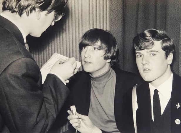 <p>John Hill, right, with John Lennon and an unknown newspaper reporter. Image: David Duggley Auctioneers / SWNS</p>