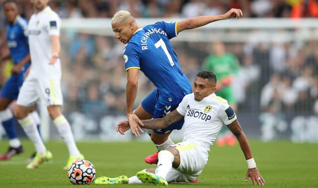 <p>Everton forward Richarlison challenges Leeds’ Raphinha. Picture: Jan Kruger/Getty Images</p>