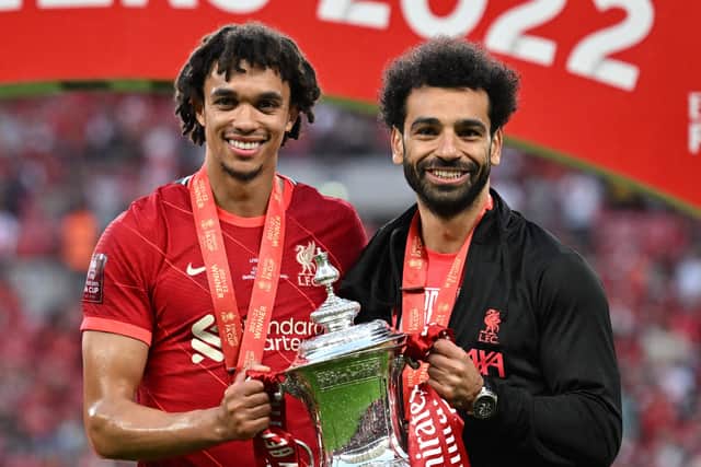 Mo Salah celebrates Liverpool’s FA Cup triumph with Trent Alexander-Arnold. Picture: BEN STANSALL/AFP via Getty Images