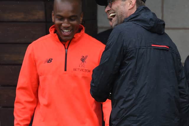 Andre Wisdom speaks with Liverpool manager Jurgen Klopp. Picture: John Powell/Liverpool FC via Getty Images