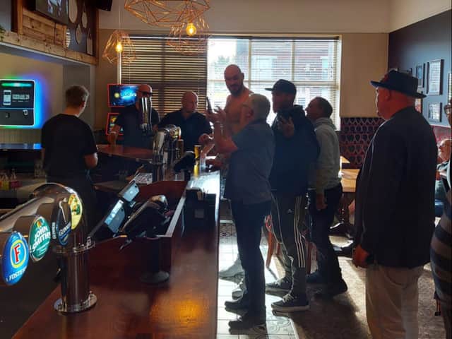 <p>Tyson Fury enjoying himself at The Queens pub, Aintree. Image: @any_spare/twitter</p>