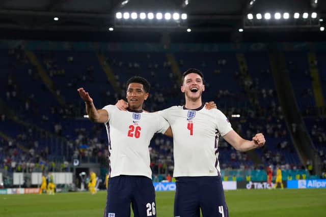 Jude Bellingham and Declan Rice celebrate after England’s defeat of Ukraine at Euro 2020. Picture: Alessandra Tarantino - Pool/Getty Images