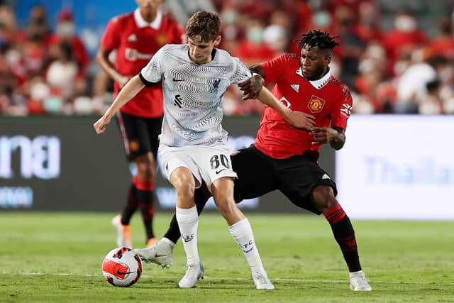 Tyler Morton on the ball for Liverpool against Man Utd. Picture: Pakawich Damrongkiattisak/Getty Images