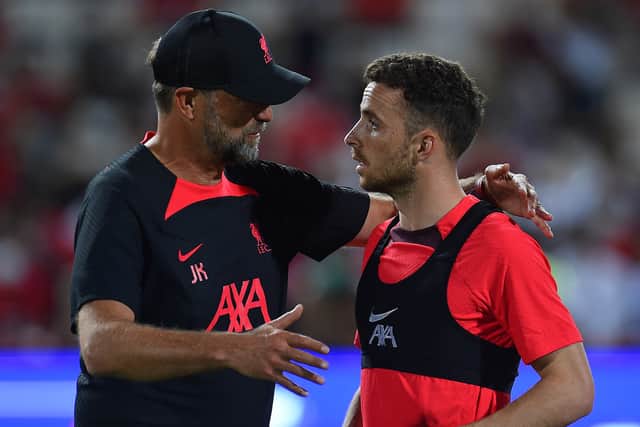 Diogo Jota speaks with Liverpool manager Jurgen Klopp. Picture: John Powell/Liverpool FC via Getty Images