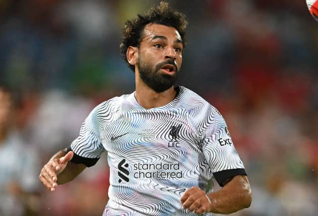 Mo Salah in Liverpool’s new away kit, which is sponsored by Standard Chartered. Picture: MANAN VATSYAYANA/AFP via Getty Images